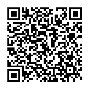 巴克正在天正大厦的办公室里看着关于这篇很不好收尾的事态报告二维码生成